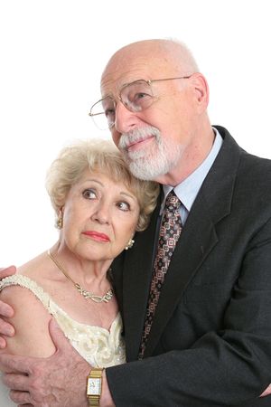A handsome senior couple looking worried as they face the future.の写真素材