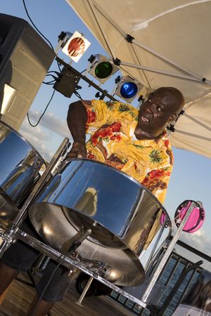 A Caribbean musician jamming on his steel drums.の写真素材
