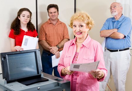 Politically active senior lady at the polls.  の写真素材