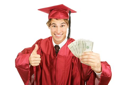 Excited graduate holding a fist full of cash for college and giving a thumbs-up sign.  Isolated on white.の写真素材