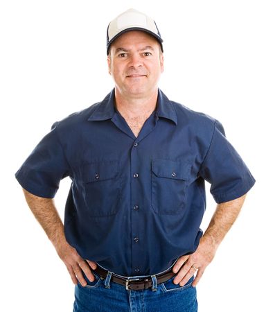Handsome service man with his hands on his hips.  Isolated on white.  の写真素材