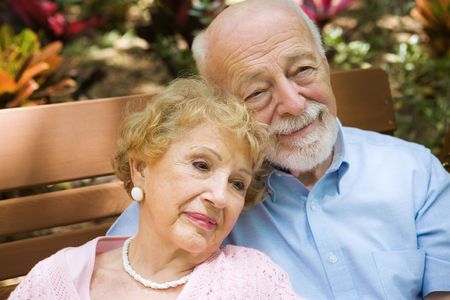 Beautiful senior couple relaxing and reminiscing about their life together.  