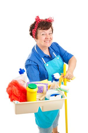 Cheerful cleaning lady holding her tray of cleaning tools and products.  Isolated on white.  の写真素材