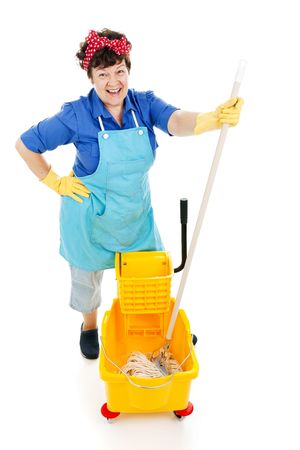 Friendly, happy maid gets ready to mop a floor.  Isolated on white.の写真素材