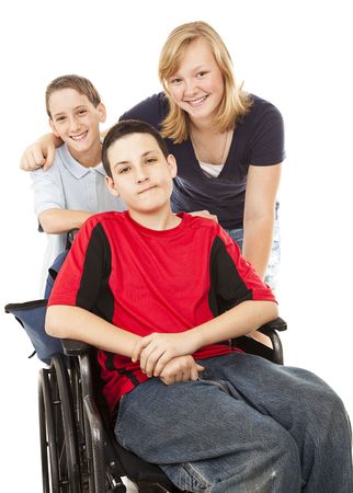 Disabled boy in wheelchair with his brother and sister.  Isolated on White.の写真素材