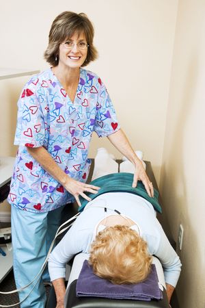 Happy physical therapist loves working with chiropractic patients.  の写真素材