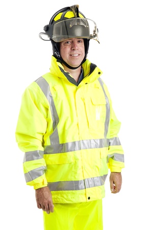 Handsome fire fighter isolated on white background.  の写真素材