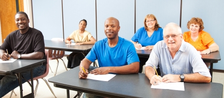 Diverse adult education or college class.  Wide angle banner.