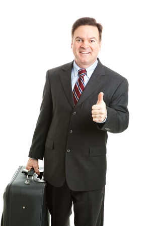 Businessman traveling with his suitcase, giving a thumbs up sign.  Isolated on white.の写真素材