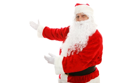 Santa Claus with his arms out in a presenting gesture.  Isolated design element.  の写真素材