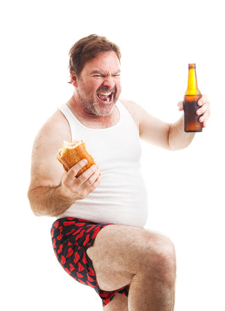Exited middle aged man in his underwear, watching the game on tv.  の写真素材