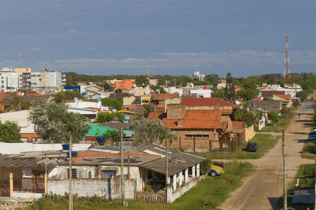 Some small houses in a village in Cassino beach, Rio Grande city, Rio Grande do Sul, Brazil.の写真素材