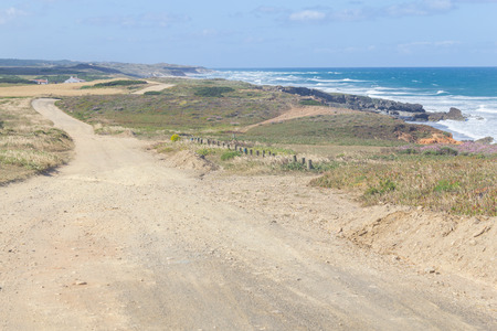 Beach Trail and ocean in Porto Covo, Alentejo, Portugalの写真素材