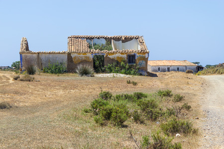 Trail and abandoned house in Arrifana, Aljezur, Algarve, Portugalの写真素材