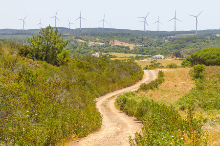 Trail and wind farm in the mountain in Aljezur, Algarve, Portugal