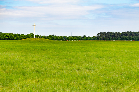 Cross, fields and trees in Phoenix park, Dublin, Irelandの写真素材