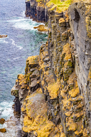 Cliffs of Moher with birds, rocks and ocean, Doolin, Clare, Irelandの写真素材