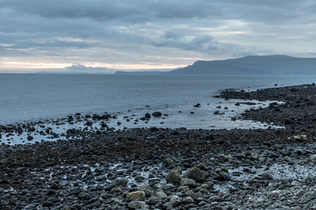 Sunrise in Carnlough bay, Antrim, Northern Ireland, UKの写真素材