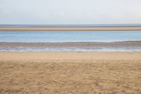 Low tide in Burrow beach, Sutton, Dublin, Irelandの写真素材