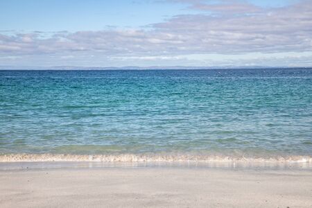 Beach with sand and waves in Inisheer island, Galway, Irelandの写真素材