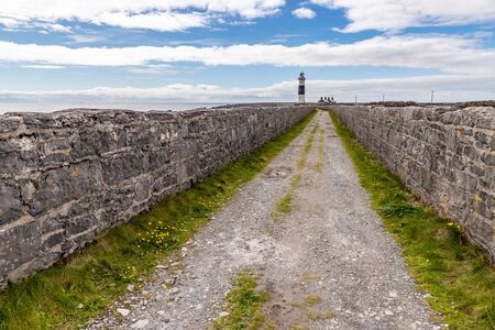Road to Lighthouse  in Inisheer island, Galway, Irelandの写真素材