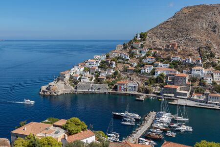 Boat arriving pier in  in Hydra Island, Greeceの写真素材