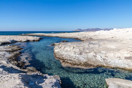 Cliffs and rocks in Sarakinko beach, Milos, Greece