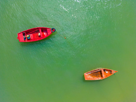 Aerial view of pier with fisherman boats, Canto Grande beach, Bombinhas, Santa Catarina, Brazilの写真素材