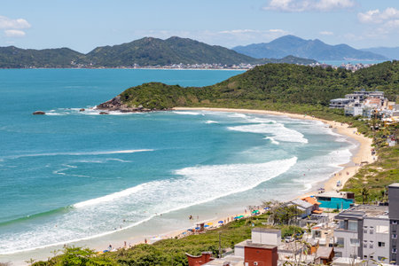 Quatro Ilhas beaches with buildings, mountains, forest and Mariscal beach in the background, Santa Catarina, Brazilの写真素材