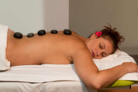 woman receiving facial massageの写真素材