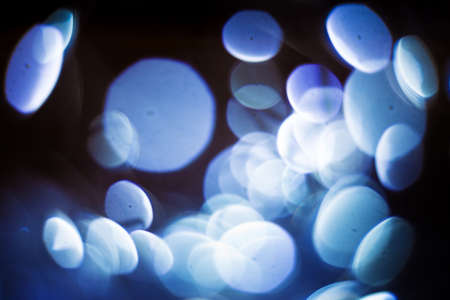Beautiful vintage abstract background with christmas lights in boken. Old filmphoto effect. Amazing...