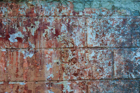 Old plaster texture. Grunge background. Plastered cracked wall surface.