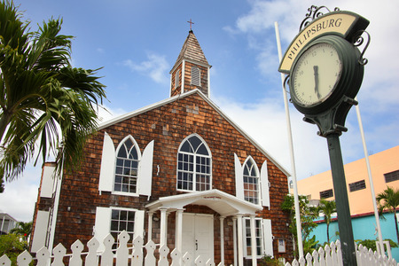 The Methodist Church with a traditional street clock outside, Philipsburg, St Maarten, Caribbean.の写真素材
