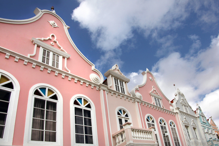 Typical pastel painted architechture of Aruba, Curacao & Bonaire, Caribbean.の写真素材