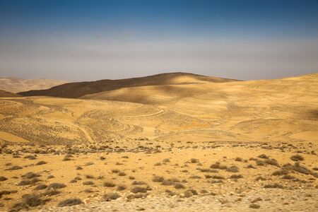 King's Highway road accross the desert between Aqaba & Petra, Jordan.の写真素材