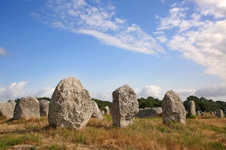 Thousands of prehistoric standing stones spread across three alignments at Carnac, Brittany, northwest France.の写真素材