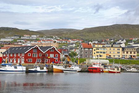 Town of Hammerfest with the port habour with fishing boats. Hammerfest is the northernmost town in the world with more than 10,000 inhabitants, county, Norway.の写真素材