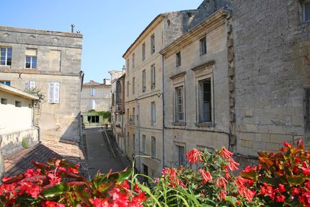 Traditional buildings in Bourg, which is a village located on the  bank of the Dordogne, in the...