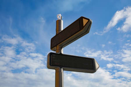 Modern digital sign post. Moves to direction to point and displaysinformation as text and images,...