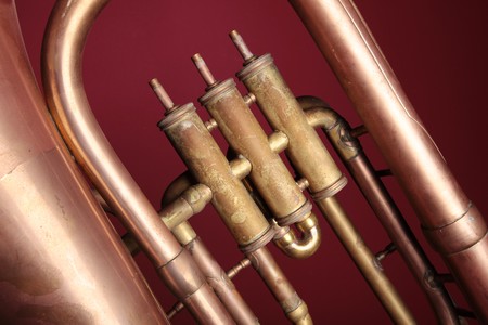 A detail of an old euphonium (from the tuba family).の写真素材