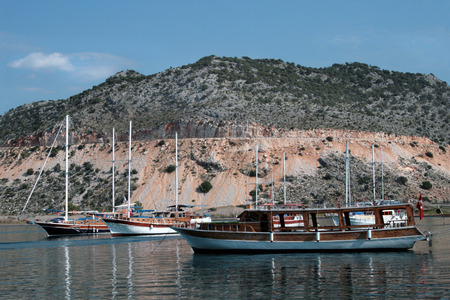Yachts on the background of the island in Turkeyの写真素材