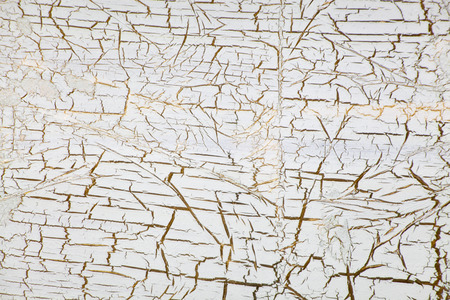 Craquelure on gold with white paintの写真素材