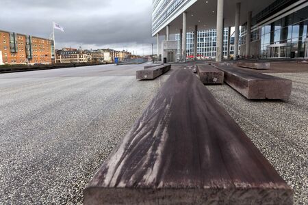 Bench of timber on the public square in the city of ?rhusのeditorial素材