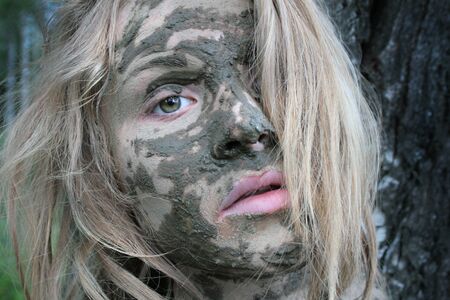 Girl with a mask at an ecological resort. Beautiful blondeの写真素材