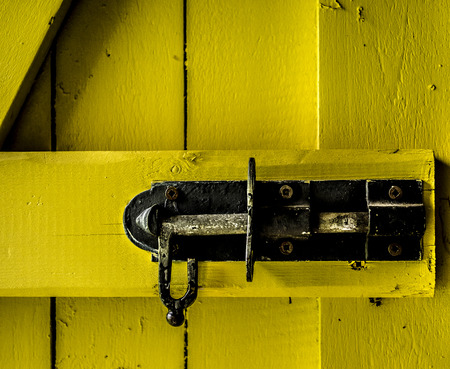 The object of this yellow door is used to block access to the barn.の写真素材