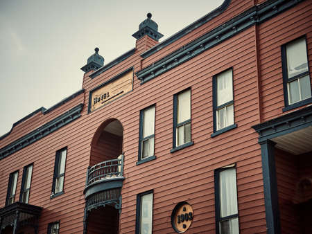 This building made of wood dates from 1903. It is very beautiful with its carved decorations. She meets in one of the cities of the province of Quebec, Canada, January 24, 2020.のeditorial素材