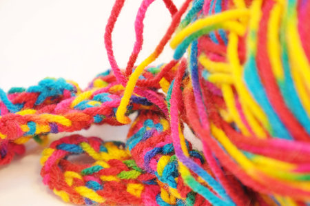 multi colored yarn isolated on a white background closeupの写真素材