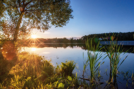 Early morning on a lake in Russia. Panoramic image.の写真素材