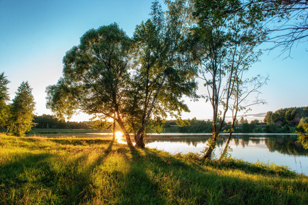 Early morning on a lake in Russia. Panoramic image.の写真素材