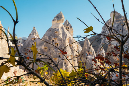 Cave dwelling and columbariums at the valley of Uchisar town. Cappadocia, Turkey.の写真素材